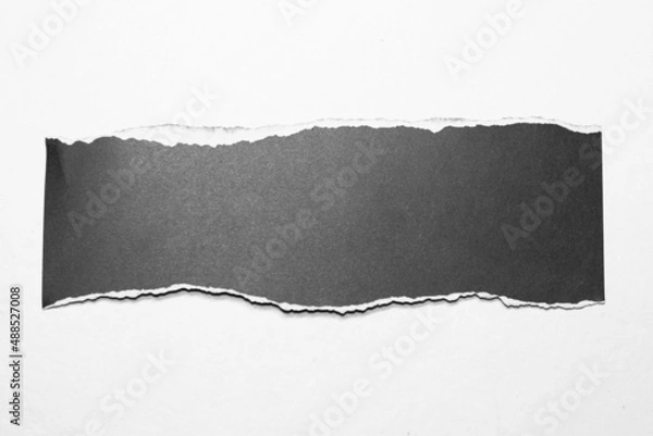 Fototapeta Paper tear, ripped paper edge, torn edge, isolated paper tear white on black, paper corner with space for copy
