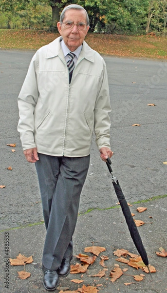 Fototapeta Retired gentleman with umbrella