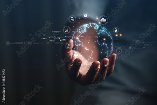 Fototapeta Businessman presenting futuristic business world metaverse graphic. In the form of innovation in digital business processing technology, innovation of the 21st century	