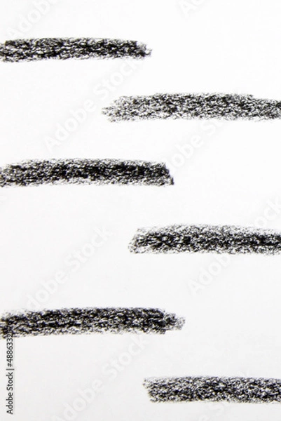 Fototapeta Dirty grunge design element, field or background for text. Rough smears and rough spots. Ink-drawn illustration isolated on a white background