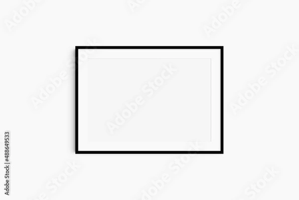Fototapeta Horizontal frame mockup 7:5, 70x50, A4, A3, A2, A1 landscape. Single black frame mockup. Clean, modern, minimalist, bright. Passepartout/mat opening in 3:2 aspect ratio.