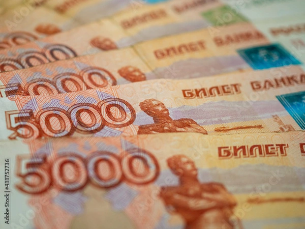Fototapeta Russian money background. Russian roubles, russian rubles cash closeup. Rubles in cash. Finance and business background. 5000 rubles. Money macro. 