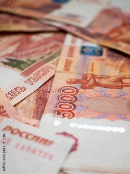 Fototapeta Russian money background. Russian roubles, russian rubles cash closeup. Rubles in cash. Finance and business background. 5000 rubles. Money macro. 