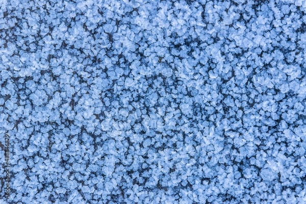 Fototapeta the texture of the surface covered with ice crystals