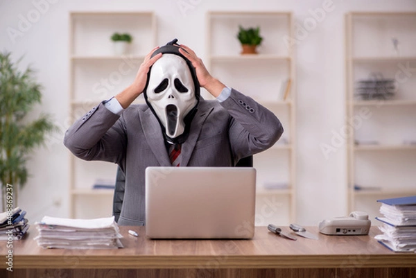 Fototapeta Devil businessman employee sitting at workplace