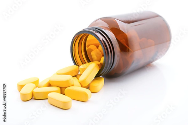 Fototapeta Yellow pills