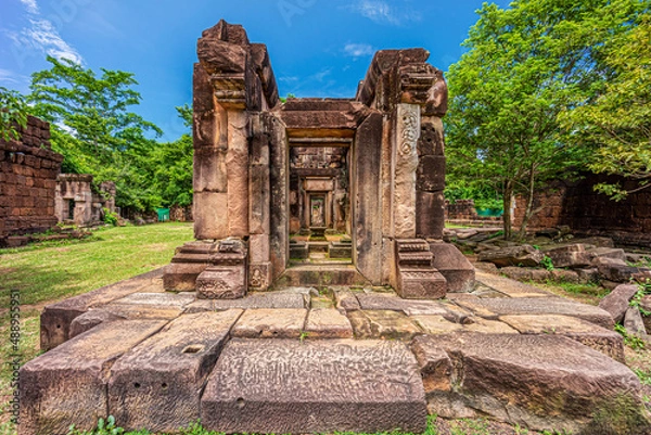 Fototapeta Front corridor leads to Principal Tower of Prasat Ta Muean Thom. It is an Ancient Khmer temple in Surin province, Thailand, Southeast Asia.