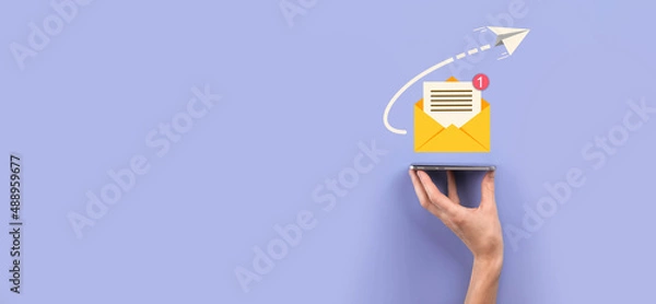 Fototapeta Businessman hand holding letter icon,email icons.Contact us by newsletter email and protect your personal information from spam mail.Customer service call center contact us.Email marketing newsletter.