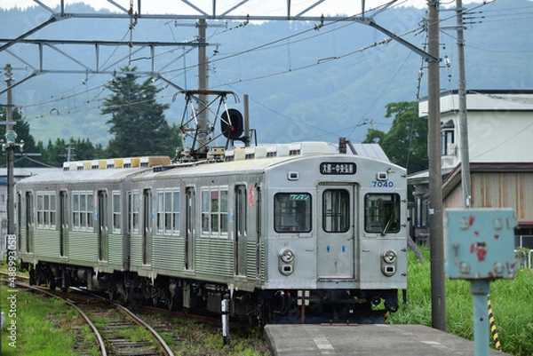 Obraz 弘南鉄道の電車