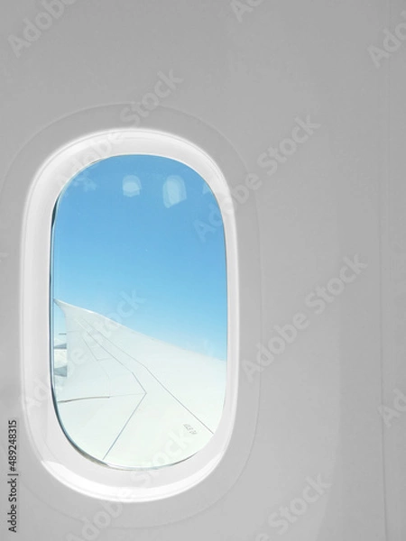Obraz 航空機の窓から見える空
