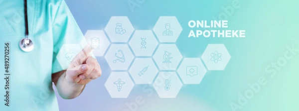 Fototapeta Online-Apotheke. Männlicher Arzt zeigt mit Finger auf digitales Hologramm aus Icons. Text mit medizinischen Begriff. Konzept für Digitalisierung in der Medizin
