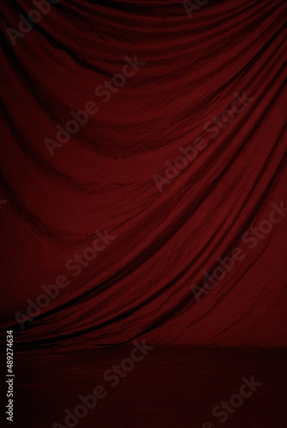 Fototapeta Dark red canvas or muslin fabric cloth studio backdrop or background.