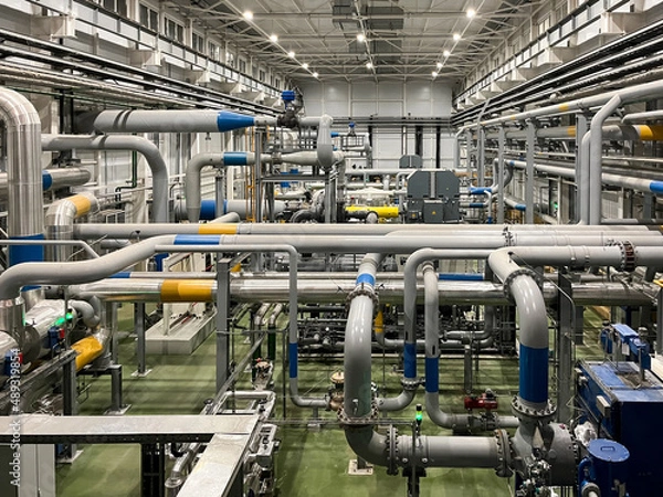 Fototapeta Machine room with industrial compressors and pipelines