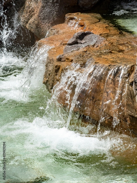 Obraz water flowing over rocks