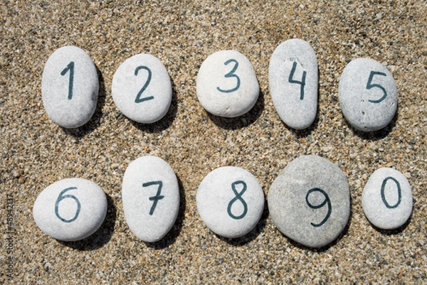 Obraz Stones with sand background