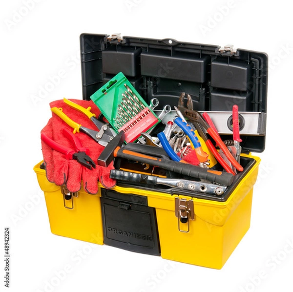 Fototapeta Yellow, a plastic box filled with tools. Isolated.