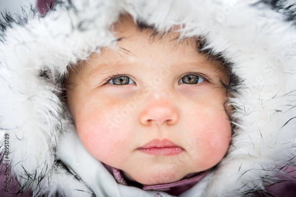 Obraz Happy baby on the winter background