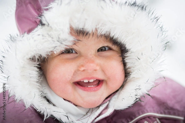 Obraz Happy baby on the winter background