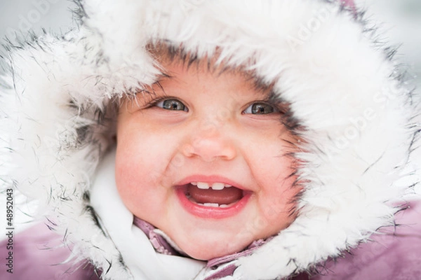 Obraz Happy baby on the winter background