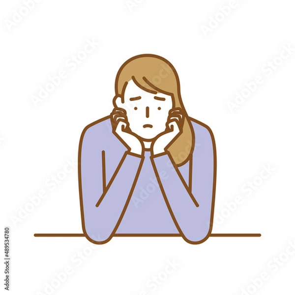 Obraz アゴに手をあてうつむき落ち込む女性