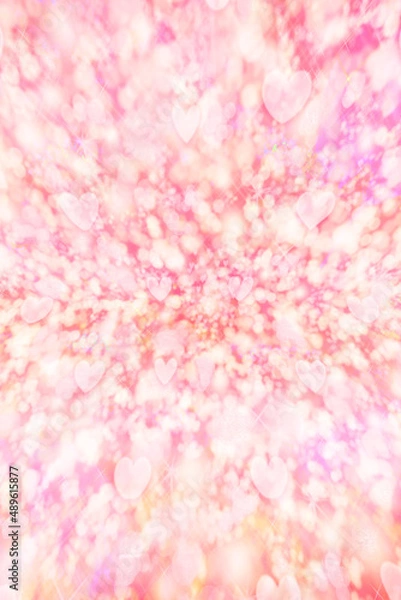 Fototapeta キラキラとハートが飛び交うピンク色の華やかな背景　縦