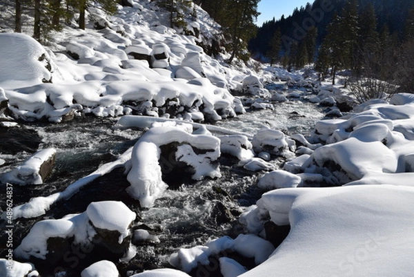 Obraz River running through snow-covered rocks
