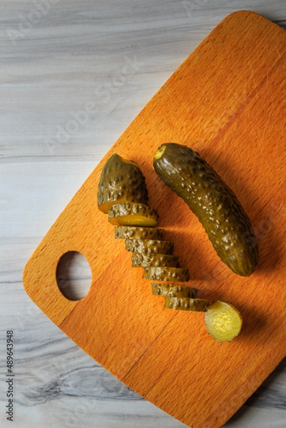 Fototapeta Pickled cucumbers in a jar.