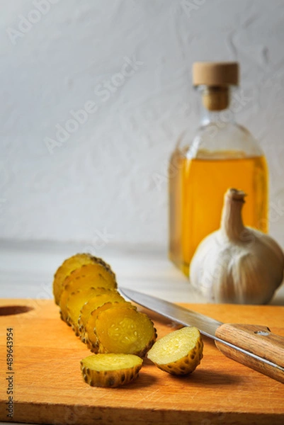 Fototapeta Pickled cucumbers in a jar.