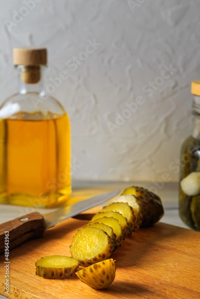 Fototapeta Pickled cucumbers in a jar.