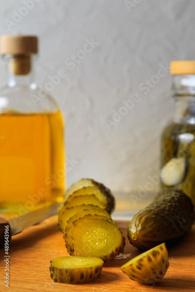 Fototapeta Pickled cucumbers in a jar.