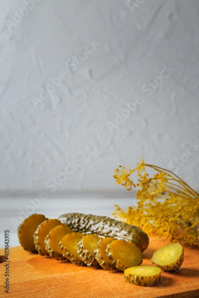 Fototapeta Pickled cucumbers in a jar.