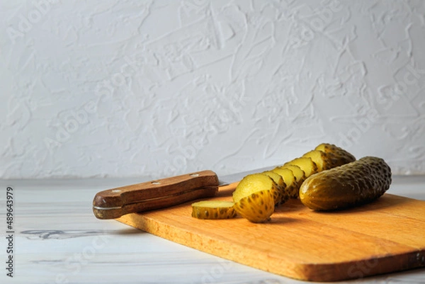 Fototapeta Pickled cucumbers in a jar.