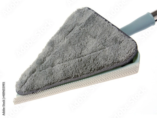 Obraz The mop is triangular with interchangeable nozzles.