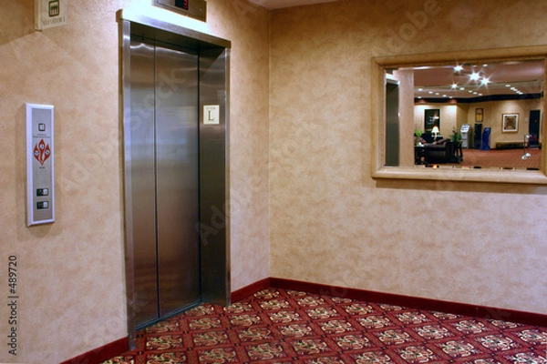 Fototapeta hotel elevator near lobby