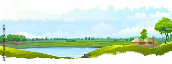 Fototapeta A beautiful lake is present in the middle of the rice fields. Farmhouses next to farmlands.
