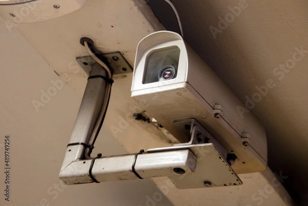 Fototapeta Security camera on a sealing.