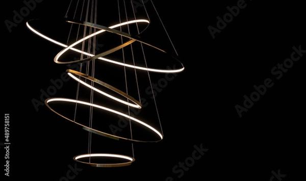 Fototapeta LED chandelier from several circles interconnected.