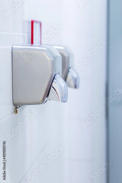 Obraz Modern hand dryer in a public restroom