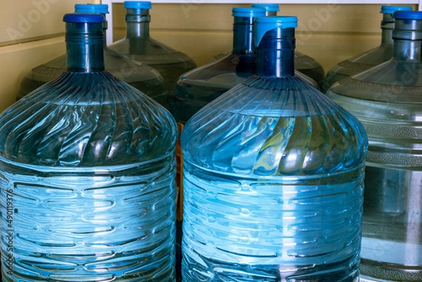 Fototapeta Drinking water bottles. Concept - collection of things during a natural disaster, emergency, quick evacuation during a disaster.