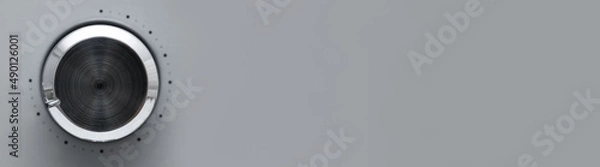 Obraz Close-up Circular button to control the temperature in the microwave oven. Button to warm food on gray background. Banner