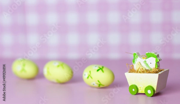 Obraz Easter card with chick and eggs on pink background with copyspace