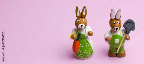 Obraz Two easter bunnies on a pink background with copyspace