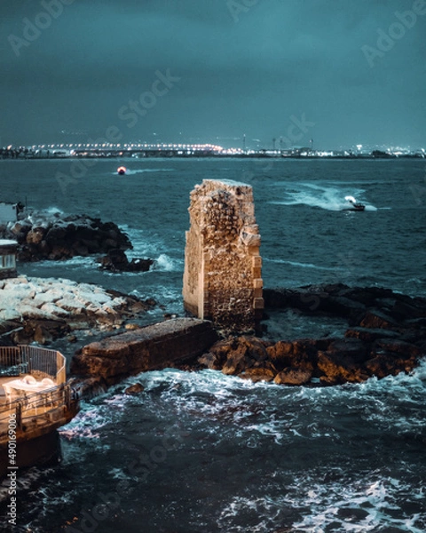 Fototapeta rock at the middle of the ocean 