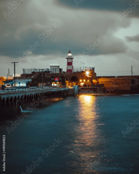 Fototapeta lighthouse at night at Akko