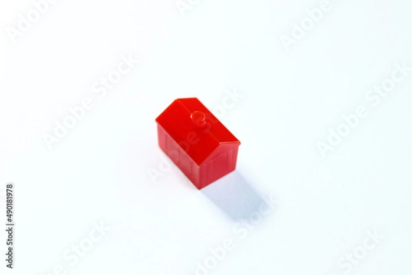Fototapeta Red toy house on white background with shadow