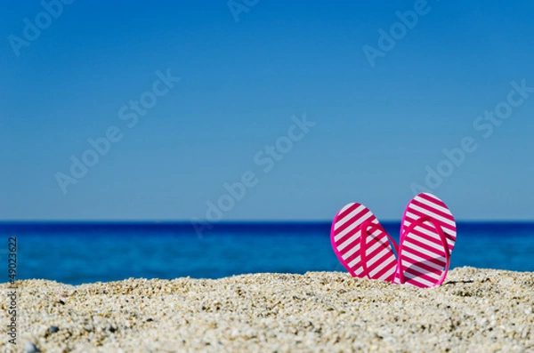 Fototapeta flip-flop on the beach