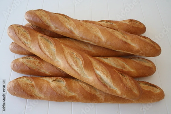 Fototapeta Several baguettes direct from the bakery