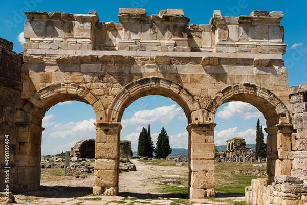 Fototapeta Sunny view of ruins of ancient Hierapolis near Pamukkale, Denizli province, Turkey.