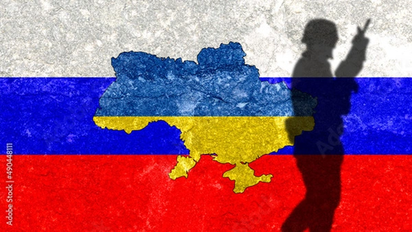 Fototapeta  Ukraine map on a wall with Russia flag painted in the background. Shadow of a soldier from Russia's war with Ukraine. War conflict between Russia and Ukraine.