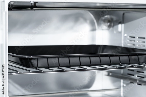 Obraz Empty Electric oven with baking sheet, view inside. Microwave